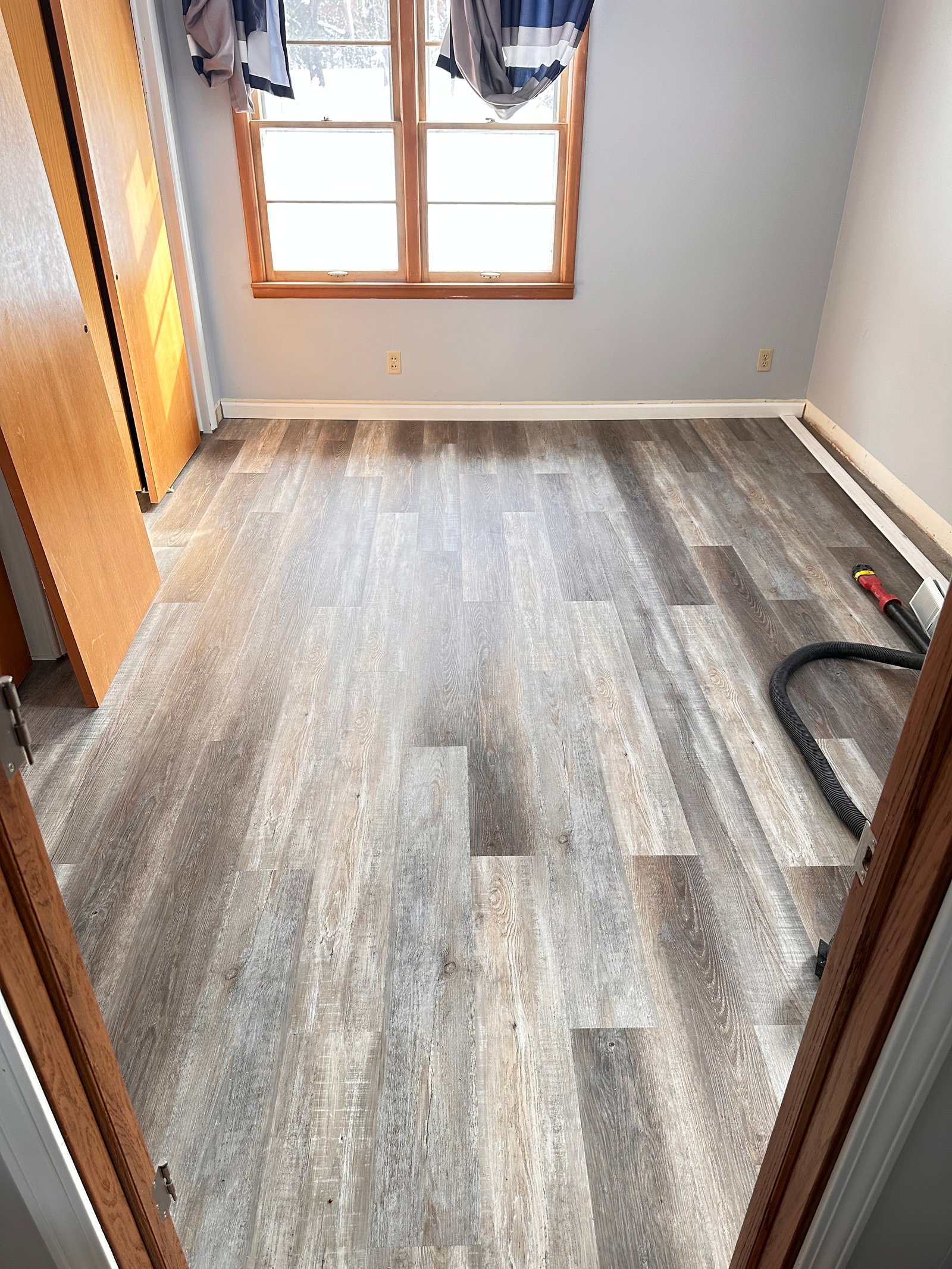 LVP flooring installation throughout main floor in Stoughton WI